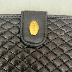 Bally Black Quilted Wallet with Gold Detail